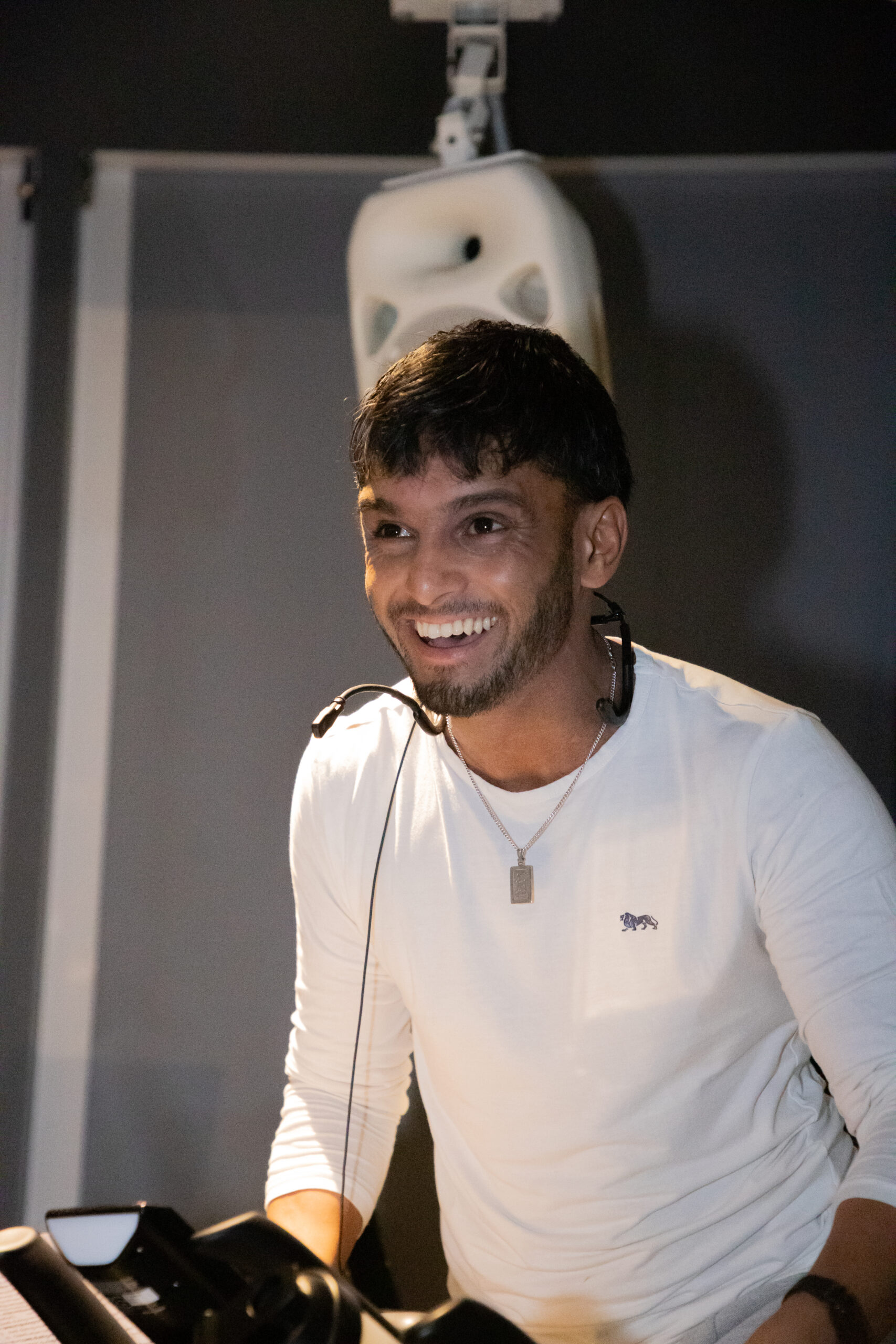 Afsar Ali, founder of Muted Healing instructing a BollyBike cycling class.