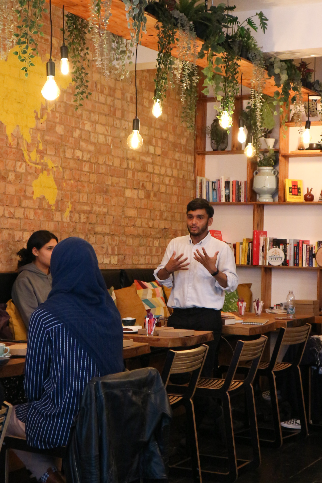 Afsar Ali, founder of Muted Healing delivering a Tatreez workshop.